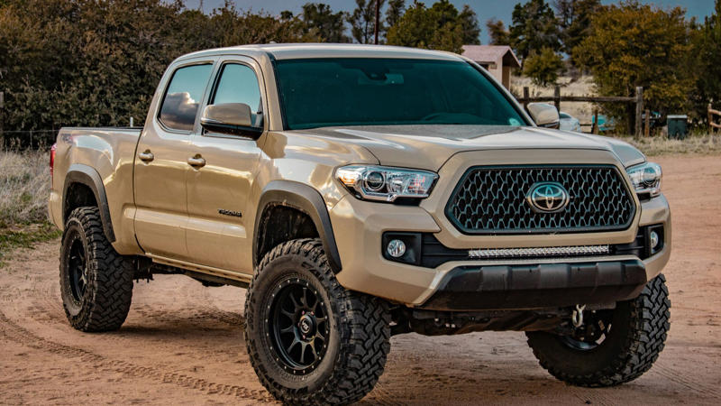 6. Toyota Tacoma 1. Jeep Grand Cherokee, 2. Nissan Xterra, 3. Suzuki Samurai, 4. Jeep Wrangler YJ, 5. Subaru Forester, 6. Toyota Tacoma, 7. Toyota 4Runner, 8. Isuzu Trooper, 9. Subaru Crosstrek Wilderness, 10. Jeep Gladiator, 1. Mercedes-Benz G-Wagon, 2. Hummer H1, 3. Rivian R1S, 4. Toyota Land Cruiser, 5. Dodge Durango SRT Hellcat, 6. Jeep Grand Wagoneer, 7. Land Rover Range Rover Sport, 8. Nissan Titan Pro-4X, 9. BMW X5, 10. Porsche Cayenne