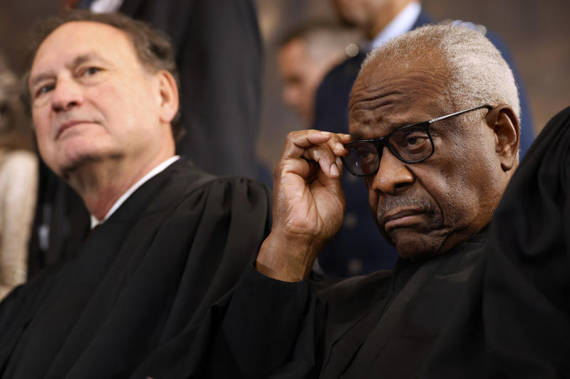 Justice Alito and Thomas at Trump’s inauguration, January 2025 Justice Alito and Thomas at Trump’s inauguration, January 2025, Clarence Thomas speaking at Notre Dame, September 2021, Ceremony honoring unclaimed veterans, June 2023, Group photo of Supreme Court Justices, June 2017, American flag on George Washington Bridge, June 2023, Chief Justice Roberts with Justice Thomas, December 2023, Justices at Ginsburg’s private ceremony, September 2020