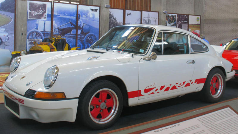 The Porsche Garage That’s a Museum, Over 40 Porsches and Counting, 1949 Porsche 356/2 Gmünd, 1955 Porsche 550 Spyder, 1959 Porsche 718 RSK, 1973 Porsche 911 Carrera RS 2.7, Porsche 959: From the Future, 1990 Porsche 964 Carrera 4 Lightweight, 1998 Porsche 993 GT2, Porsche Carrera GT, He Even Sold Some… For Millions, It’s Not Just the Cars: It’s the Culture, Comedians in Porsches Getting Coffee, A Porsche Historian in a Comedian’s Body, The Legacy on Four Wheels