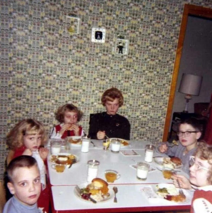 The Angry Teen at the Kids’ Table The Thanksgiving That Started at 6AM, When Dinner Was an Event, Not Just a Meal, Queen of the Kitchen: Grandma, Dad Wasn't Talking, He Was Eating, Men Sat. Women Ran the Show., Grandpa Fed Grandma and We All Looked Away, Thanksgiving: AKA The Super Bowl of Eating, Dinner Was Ready. You Came Running., Cowboys at the Kids’ Table, No Talking. Just Chewing., Men Set the Table... Once, The Rolls Were Sacred. Don’t Touch Until Grace., Little Miss No-Fork Energy, When She Brought ‘The Boyfriend’, Holiday Dinners Hit Different, Everyone Was There (Even That One Cousin), The Angry Teen at the Kids’ Table, Why Is There a Creepy Doll at the Table?, Oh No, He Brought the Guitar Again, The Table Where Everything Happened, Hot Meal. Hotter Drama., Not Quite Kids, Not Quite Teens, Dad and the Wine Bottle: A Love Story, Baby’s First Fork