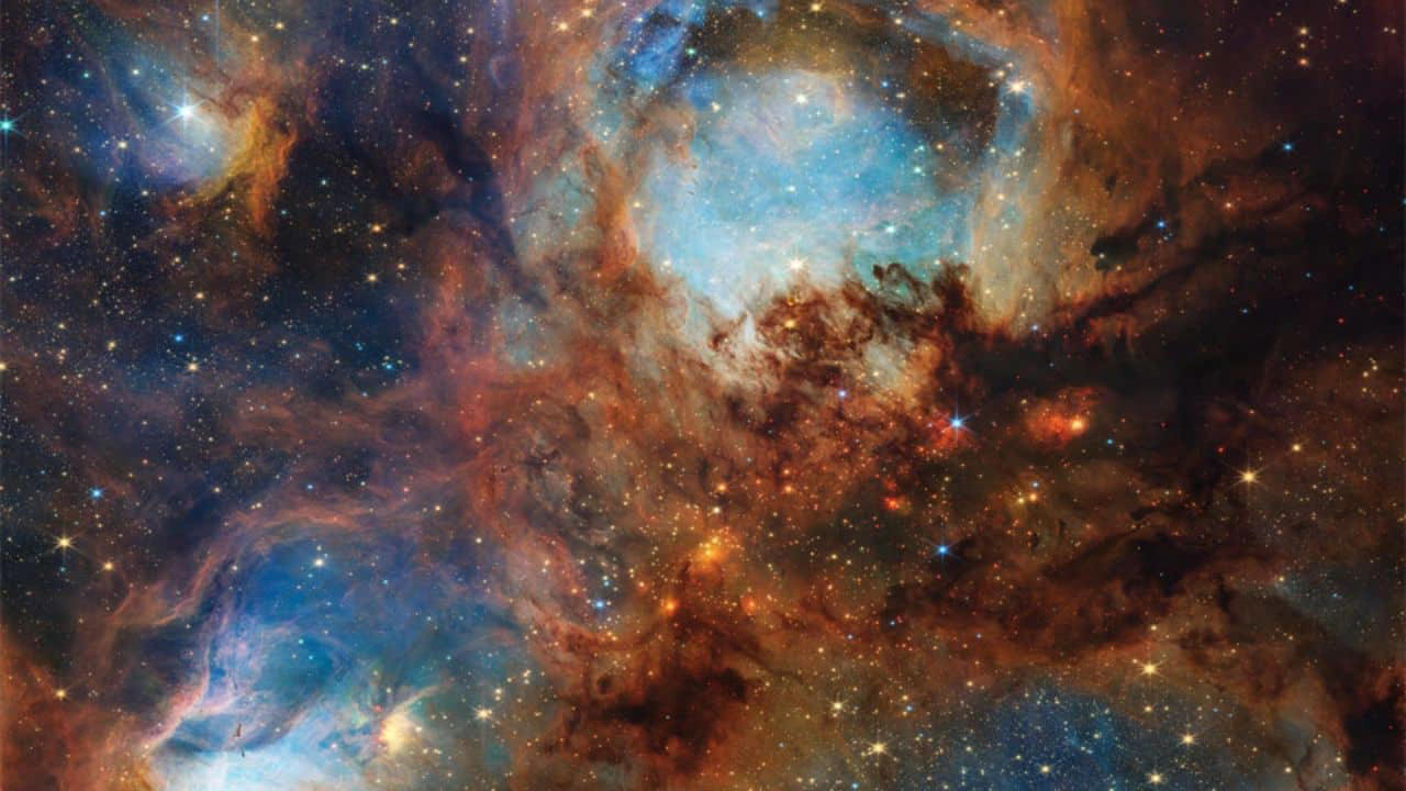 Cat's Paw Nebula from Webb Space Telescope: The James Webb Space Telescope captures the Cat’s Paw Nebula in stunning detail, revealing newborn massive stars and offering fresh insight into how turbulent clouds transform gas into brilliant stellar nurseries. (Image: NASA)