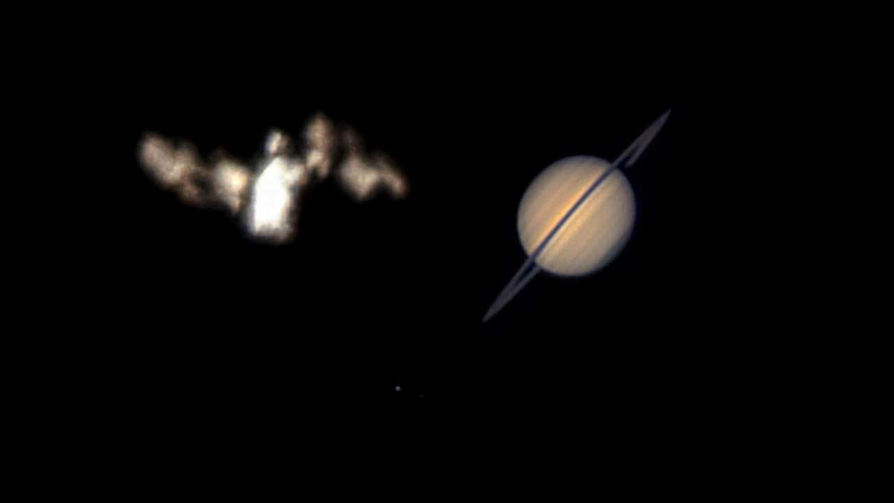 ISS Meets Saturn: Saturn and the ISS briefly aligned over Washington on July 6. Captured through a telescope, the rare sight showed both in one frame, despite being 1.4 billion kilometres apart. (Image: NASA)