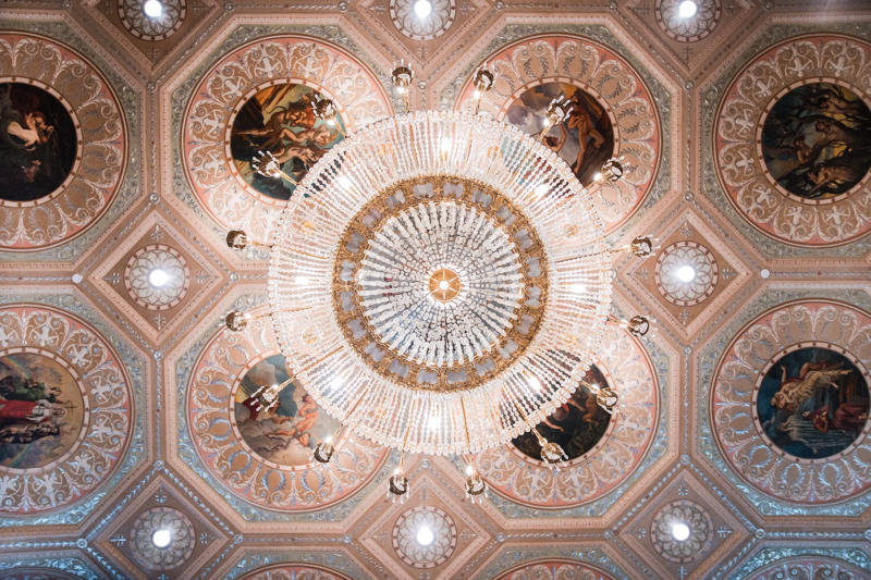 The ceiling art was sourced from the 18th-century dining room at Basildon Park Manor in England.