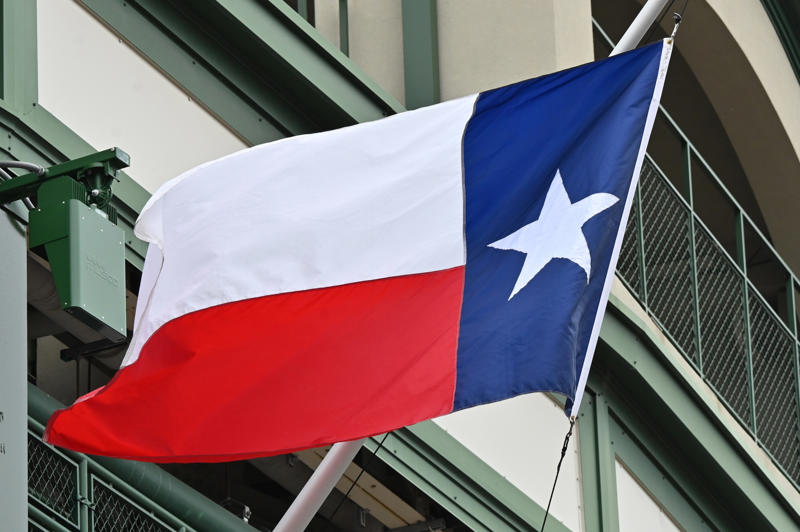 Texas flag at Wrigley Field before a game Texas and U.S. flags at the State Capitol, Texas flag at Wrigley Field before a game, Trump exits Airforce One in Austin, Trump waves to supporters at the airport, Hakeem Jeffries speaks at the Democratic Convention, Hakeem Jeffries arrives for Congress session, Hakeem Jeffries speaks at press conference in Alabama, Eric Swalwell meets with local police in Iowa, Rep. Troy Nehls supports Trump in hearing room, Rep. Troy Nehls speaks during campaign stop