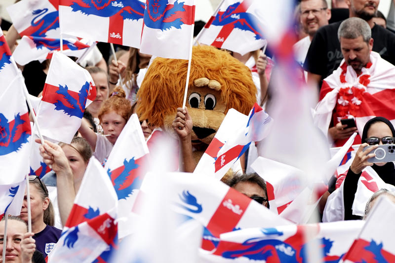 England trophy parade live, Lionesses say 65,000 people attend victory parade celebrations, Princess Beatrice and children join crowds for Lionesses’ football victory parade, England's celebrations go bigger and better, How did the Lionesses celebrate on Monday?, In pictures: Tens of thousands line The Mall, Lionesses leave the stage, In pictures: Lionesses celebrate historic win, Princess Beatrice and family pictured in the crowds, Sweet Caroline blasts along The Mall, England lifts Euros trophy, Chloe Kelly jokes 'What pressure?' as she thanks the crowds, Pictured: Lionesses reach Buckingham Palace, Sarina Wiegman surprised onstage by Burna Boy, Emotional Leah Williamson 'holding back tears' as she thanks crowds, In pictures: Lionesses greet jubilant crowds in victory parade, 'Sweet Caroline' blasts to the crowds, Victory parade reaches Buckingham Palace, 'I've never seen anything like it'; Alessia Russo celebrates along The Mall, In pictures: Fans cheer for the Lionesses, Captain Leah Williamson seen lifting trophy to cheers of the crowd, First pics of the Lionesses celebrating alongside thousands of England fans, The Lionesses arrive to kick off procession, Live: Watch Lionesses victory parade in central London, Supporters travel from across the UK to cheer on Lionesses, Minutes to go, Thousands of fans make their way to The Mall, Fans out in force, Live: Lionesses victory parade aerial footage as thousands celebrate England Euro 2025 victory, 'The standard of football is second to none', Fans 'very proud' of Lionesses, The truth behind Chloe Kelly’s unwavering confidence, 'Hopefully this will encourage more people to support women's football', England flags flying, One hour to go, The Mall is filling up, A look back at 2022, 'I was jumping in the air on Sunday', 'This team shows what it's like to be English', 'Amazing to see the progress from the last Euros', How can I watch the Lionesses victory parade?, A look back at 2022, Today's parade route, Weather no match for England fans, Preparations underway, Excitement building in London, Lionesses use 'their voice for change', London ready for England parade after Euro 2025 glory, Why Sarina Wiegman is the best manager in the world, The sweary gift Sarina Wiegman used to inspire Lionesses before Euro 2025 final, Keir Starmer calls to congratulate Lionesses, Wiegman hopes win will 'push women's game even more', Lionesses attend Downing Street reception to celebrate success, What has the goverment said about the parade?, What has the FA said about the trophy parade?, How to watch the ceremony on TV or online, Attending the homecoming parade, England trophy parade: Route, map and schedule for Euro 2025 victory celebrations, England trophy parade: Route, map and schedule for Euro 2025 victory celebrations