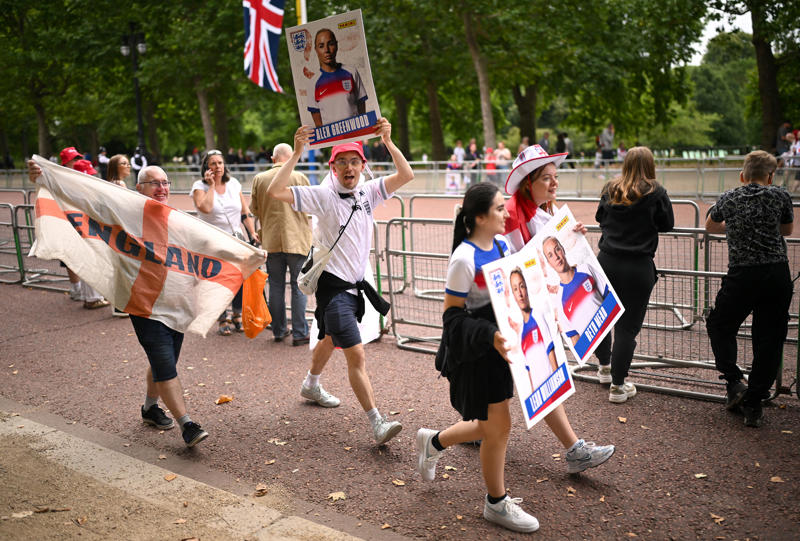 England trophy parade live, Lionesses say 65,000 people attend victory parade celebrations, Princess Beatrice and children join crowds for Lionesses’ football victory parade, England's celebrations go bigger and better, How did the Lionesses celebrate on Monday?, In pictures: Tens of thousands line The Mall, Lionesses leave the stage, In pictures: Lionesses celebrate historic win, Princess Beatrice and family pictured in the crowds, Sweet Caroline blasts along The Mall, England lifts Euros trophy, Chloe Kelly jokes 'What pressure?' as she thanks the crowds, Pictured: Lionesses reach Buckingham Palace, Sarina Wiegman surprised onstage by Burna Boy, Emotional Leah Williamson 'holding back tears' as she thanks crowds, In pictures: Lionesses greet jubilant crowds in victory parade, 'Sweet Caroline' blasts to the crowds, Victory parade reaches Buckingham Palace, 'I've never seen anything like it'; Alessia Russo celebrates along The Mall, In pictures: Fans cheer for the Lionesses, Captain Leah Williamson seen lifting trophy to cheers of the crowd, First pics of the Lionesses celebrating alongside thousands of England fans, The Lionesses arrive to kick off procession, Live: Watch Lionesses victory parade in central London, Supporters travel from across the UK to cheer on Lionesses, Minutes to go, Thousands of fans make their way to The Mall, Fans out in force, Live: Lionesses victory parade aerial footage as thousands celebrate England Euro 2025 victory, 'The standard of football is second to none', Fans 'very proud' of Lionesses, The truth behind Chloe Kelly’s unwavering confidence, 'Hopefully this will encourage more people to support women's football', England flags flying, One hour to go, The Mall is filling up, A look back at 2022, 'I was jumping in the air on Sunday', 'This team shows what it's like to be English', 'Amazing to see the progress from the last Euros', How can I watch the Lionesses victory parade?, A look back at 2022, Today's parade route, Weather no match for England fans, Preparations underway, Excitement building in London, Lionesses use 'their voice for change', London ready for England parade after Euro 2025 glory, Why Sarina Wiegman is the best manager in the world, The sweary gift Sarina Wiegman used to inspire Lionesses before Euro 2025 final, Keir Starmer calls to congratulate Lionesses, Wiegman hopes win will 'push women's game even more', Lionesses attend Downing Street reception to celebrate success, What has the goverment said about the parade?, What has the FA said about the trophy parade?, How to watch the ceremony on TV or online, Attending the homecoming parade, England trophy parade: Route, map and schedule for Euro 2025 victory celebrations, England trophy parade: Route, map and schedule for Euro 2025 victory celebrations
