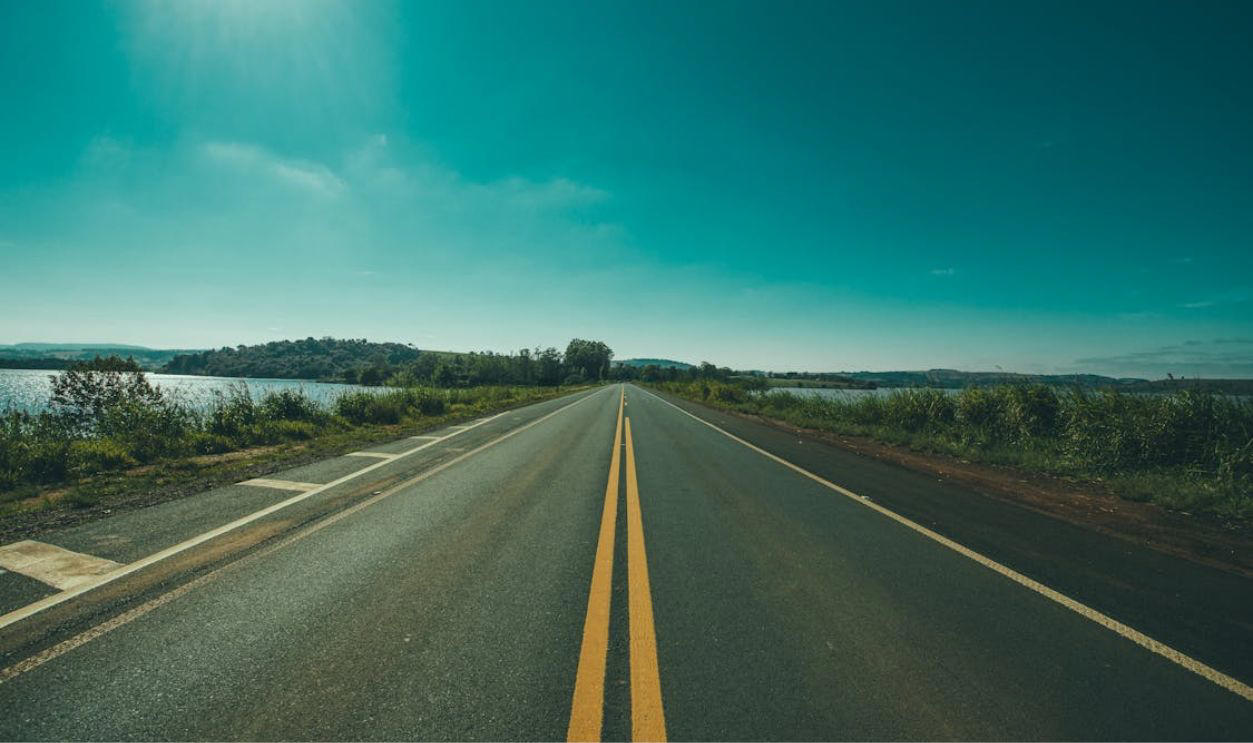 Still Road-Ready—Or Rusty Behind the Wheel?, Q: What does a flashing red traffic light mean?, Q: When are you allowed to pass another vehicle on the right?, A: When the car ahead is turning left, A: Stop completely, regardless of your direction, A: 0.08%, Q: When should you turn your headlights on?, A: At night or in poor visibility, A: No passing in either direction, Q: When merging onto a freeway, who has the right of way?, A: Vehicles already on the freeway, Q: What should you do if your vehicle starts to hydroplane?, A: Ease off the gas and steer straight, Q: What is the hand signal for a left turn?, A: Left arm extended straight out