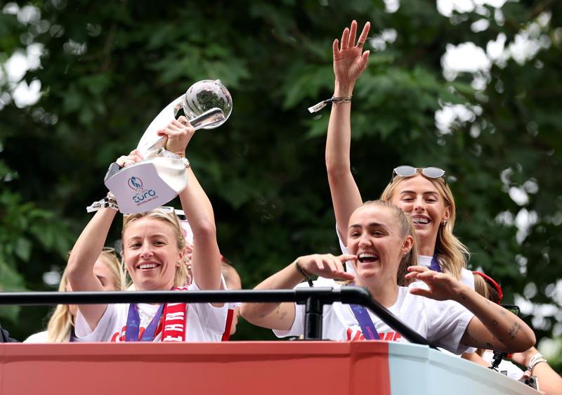 England trophy parade live, Lionesses say 65,000 people attend victory parade celebrations, Princess Beatrice and children join crowds for Lionesses’ football victory parade, England's celebrations go bigger and better, How did the Lionesses celebrate on Monday?, In pictures: Tens of thousands line The Mall, Lionesses leave the stage, In pictures: Lionesses celebrate historic win, Princess Beatrice and family pictured in the crowds, Sweet Caroline blasts along The Mall, England lifts Euros trophy, Chloe Kelly jokes 'What pressure?' as she thanks the crowds, Pictured: Lionesses reach Buckingham Palace, Sarina Wiegman surprised onstage by Burna Boy, Emotional Leah Williamson 'holding back tears' as she thanks crowds, In pictures: Lionesses greet jubilant crowds in victory parade, 'Sweet Caroline' blasts to the crowds, Victory parade reaches Buckingham Palace, 'I've never seen anything like it'; Alessia Russo celebrates along The Mall, In pictures: Fans cheer for the Lionesses, Captain Leah Williamson seen lifting trophy to cheers of the crowd, First pics of the Lionesses celebrating alongside thousands of England fans, The Lionesses arrive to kick off procession, Live: Watch Lionesses victory parade in central London, Supporters travel from across the UK to cheer on Lionesses, Minutes to go, Thousands of fans make their way to The Mall, Fans out in force, Live: Lionesses victory parade aerial footage as thousands celebrate England Euro 2025 victory, 'The standard of football is second to none', Fans 'very proud' of Lionesses, The truth behind Chloe Kelly’s unwavering confidence, 'Hopefully this will encourage more people to support women's football', England flags flying, One hour to go, The Mall is filling up, A look back at 2022, 'I was jumping in the air on Sunday', 'This team shows what it's like to be English', 'Amazing to see the progress from the last Euros', How can I watch the Lionesses victory parade?, A look back at 2022, Today's parade route, Weather no match for England fans, Preparations underway, Excitement building in London, Lionesses use 'their voice for change', London ready for England parade after Euro 2025 glory, Why Sarina Wiegman is the best manager in the world, The sweary gift Sarina Wiegman used to inspire Lionesses before Euro 2025 final, Keir Starmer calls to congratulate Lionesses, Wiegman hopes win will 'push women's game even more', Lionesses attend Downing Street reception to celebrate success, What has the goverment said about the parade?, What has the FA said about the trophy parade?, How to watch the ceremony on TV or online, Attending the homecoming parade, England trophy parade: Route, map and schedule for Euro 2025 victory celebrations, England trophy parade: Route, map and schedule for Euro 2025 victory celebrations