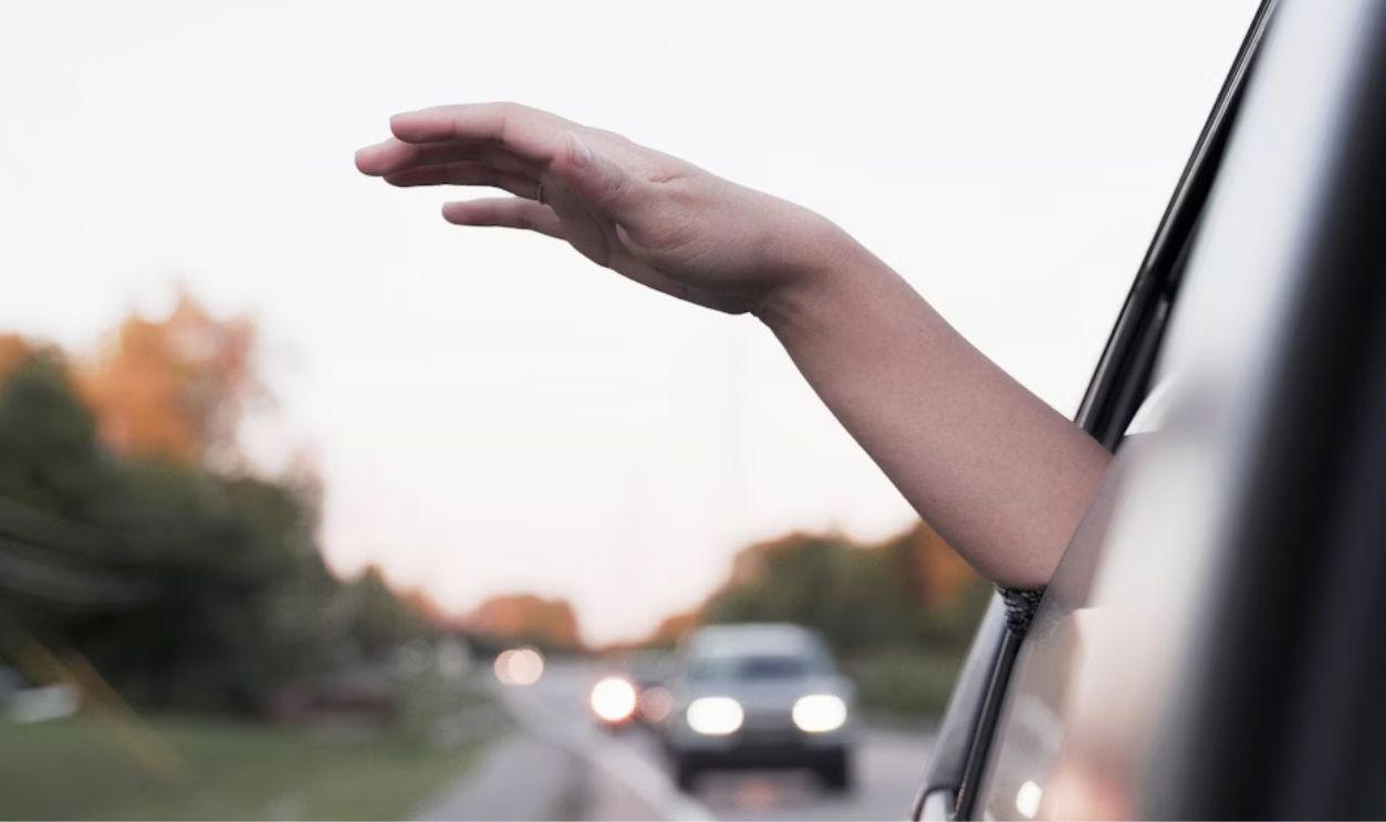 Still Road-Ready—Or Rusty Behind the Wheel?, Q: What does a flashing red traffic light mean?, Q: When are you allowed to pass another vehicle on the right?, A: When the car ahead is turning left, A: Stop completely, regardless of your direction, A: 0.08%, Q: When should you turn your headlights on?, A: At night or in poor visibility, A: No passing in either direction, Q: When merging onto a freeway, who has the right of way?, A: Vehicles already on the freeway, Q: What should you do if your vehicle starts to hydroplane?, A: Ease off the gas and steer straight, Q: What is the hand signal for a left turn?, A: Left arm extended straight out