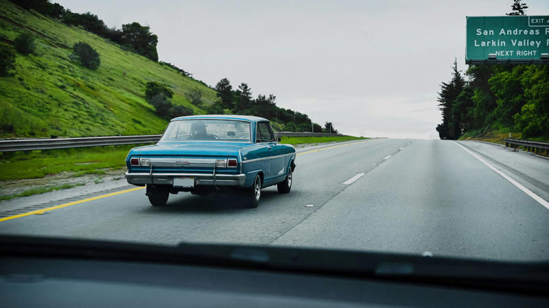 Still Road-Ready—Or Rusty Behind the Wheel?, Q: What does a flashing red traffic light mean?, Q: When are you allowed to pass another vehicle on the right?, A: When the car ahead is turning left, A: Stop completely, regardless of your direction, A: 0.08%, Q: When should you turn your headlights on?, A: At night or in poor visibility, A: No passing in either direction, Q: When merging onto a freeway, who has the right of way?, A: Vehicles already on the freeway, Q: What should you do if your vehicle starts to hydroplane?, A: Ease off the gas and steer straight, Q: What is the hand signal for a left turn?, A: Left arm extended straight out