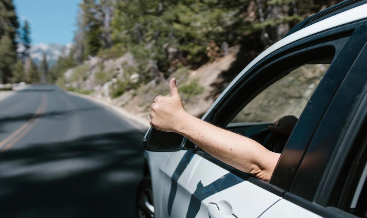 Still Road-Ready—Or Rusty Behind the Wheel?, Q: What does a flashing red traffic light mean?, Q: When are you allowed to pass another vehicle on the right?, A: When the car ahead is turning left, A: Stop completely, regardless of your direction, A: 0.08%, Q: When should you turn your headlights on?, A: At night or in poor visibility, A: No passing in either direction, Q: When merging onto a freeway, who has the right of way?, A: Vehicles already on the freeway, Q: What should you do if your vehicle starts to hydroplane?, A: Ease off the gas and steer straight, Q: What is the hand signal for a left turn?, A: Left arm extended straight out