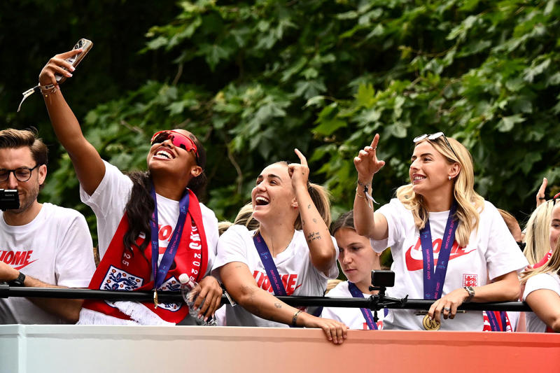 England trophy parade live, Lionesses say 65,000 people attend victory parade celebrations, Princess Beatrice and children join crowds for Lionesses’ football victory parade, England's celebrations go bigger and better, How did the Lionesses celebrate on Monday?, In pictures: Tens of thousands line The Mall, Lionesses leave the stage, In pictures: Lionesses celebrate historic win, Princess Beatrice and family pictured in the crowds, Sweet Caroline blasts along The Mall, England lifts Euros trophy, Chloe Kelly jokes 'What pressure?' as she thanks the crowds, Pictured: Lionesses reach Buckingham Palace, Sarina Wiegman surprised onstage by Burna Boy, Emotional Leah Williamson 'holding back tears' as she thanks crowds, In pictures: Lionesses greet jubilant crowds in victory parade, 'Sweet Caroline' blasts to the crowds, Victory parade reaches Buckingham Palace, 'I've never seen anything like it'; Alessia Russo celebrates along The Mall, In pictures: Fans cheer for the Lionesses, Captain Leah Williamson seen lifting trophy to cheers of the crowd, First pics of the Lionesses celebrating alongside thousands of England fans, The Lionesses arrive to kick off procession, Live: Watch Lionesses victory parade in central London, Supporters travel from across the UK to cheer on Lionesses, Minutes to go, Thousands of fans make their way to The Mall, Fans out in force, Live: Lionesses victory parade aerial footage as thousands celebrate England Euro 2025 victory, 'The standard of football is second to none', Fans 'very proud' of Lionesses, The truth behind Chloe Kelly’s unwavering confidence, 'Hopefully this will encourage more people to support women's football', England flags flying, One hour to go, The Mall is filling up, A look back at 2022, 'I was jumping in the air on Sunday', 'This team shows what it's like to be English', 'Amazing to see the progress from the last Euros', How can I watch the Lionesses victory parade?, A look back at 2022, Today's parade route, Weather no match for England fans, Preparations underway, Excitement building in London, Lionesses use 'their voice for change', London ready for England parade after Euro 2025 glory, Why Sarina Wiegman is the best manager in the world, The sweary gift Sarina Wiegman used to inspire Lionesses before Euro 2025 final, Keir Starmer calls to congratulate Lionesses, Wiegman hopes win will 'push women's game even more', Lionesses attend Downing Street reception to celebrate success, What has the goverment said about the parade?, What has the FA said about the trophy parade?, How to watch the ceremony on TV or online, Attending the homecoming parade, England trophy parade: Route, map and schedule for Euro 2025 victory celebrations, England trophy parade: Route, map and schedule for Euro 2025 victory celebrations
