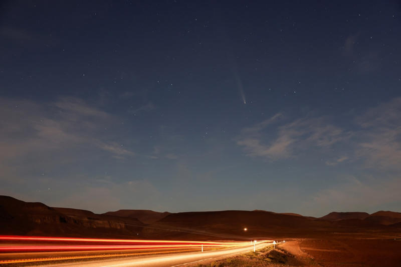 Comet Tsuchinshan-ATLAS, C/2023, passes over a road in the Sahara desert outside Ouarzazate, Morocco October 17, 2024. REUTERS/Darrin Zammit Lupi