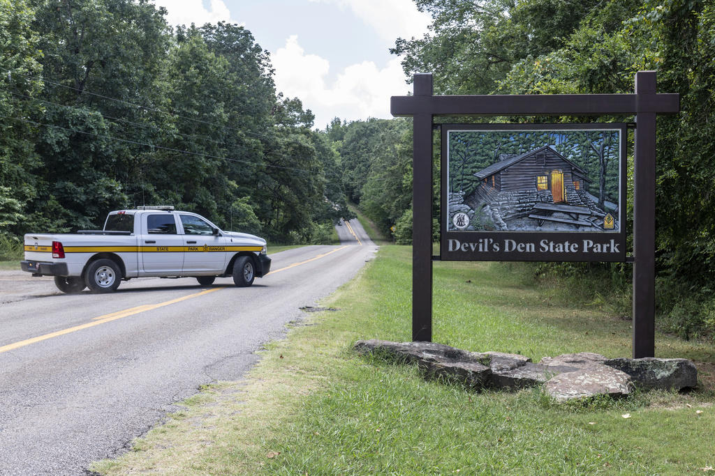Police say killer likely injured during attack, Police release photo and composite sketch, Victims had just moved to Arkansas, Police ask public for photos from park day of attack