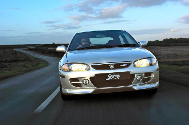 Proton Satria GTi The ‘90s saw a sea-change in cars., Mercedes-Benz 500E, Mitsubishi Eclipse GSX, Porsche 968, Nissan Sunny GTI-R, Dodge Neon R/T, Volvo 850R, Volkswagen Corrado, Vauxhall Corsa B GSI, Nissan 100NX, Lincoln Mark VIII, Ford/Mercury Cougar, Suzuki X-90, Mitsubishi Galant VR-4, Lotus Elan M100, Honda Del Sol, Citroen AX GTI, Mercury Capri, Mazda MX-3, Mitsubishi 3000GT, Alfa Romeo 164, Mitsouka Viewt, Toyota Celica, Mercedes C36 AMG, Subaru SVX, Lexus SC, Isuzu VehiCROSS, Aston Martin Vantage V550, Maserati Shamal, Ferrari 456, MTX Tatra V8, Vector W8, Honda Accord Type-R, Proton Satria GTi, Nissan R390 GT1, Rover Metro, GMC Typhoon, De Tomaso Guara, Renault Sport Spider