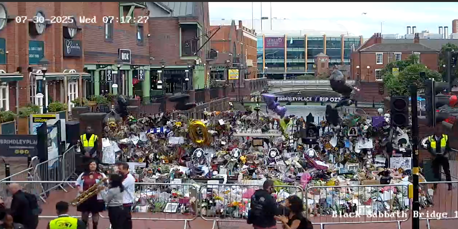 Ozzy Osbourne's funeral - key points, How to watch the Black Sabbath bench livestream, PICTURES: Fans line the streets of Birmingham ahead of Ozzy funeral procession, VIDEO: Ozzy Osbourne reveals the song that changed his life, Yungblud's moving tribute to Ozzy, Thousands of fans travel to Birmingham... and the pints are already flowing, Mayor calls Ozzy Osbourne 'a son of Birmingham', Ozzy fan renames his pet 'Doggy Osbourne' for the day, 'Ozzy Osbourne was completely himself... money didn't change him', Ozzy Osbourne flung open hell’s musical gates – and changed the world, Couple Karen and Steve Brookhouse: 'There will never be another Ozzy', Hundreds of people are already gathered at the barriers, Ozzy Osbourne wanted his funeral to be ‘celebration, not a mope-fest’, Graffiti artist Mr Murals helps touch up murals before the funeral procession, What Ozzy's fellow artists said in tributes after his death, Senior reporter Holly Evans is in Birmingham ahead of the funeral procession, Fans prepare to say final goodbye to the Prince of Darkness, Who are Bostin' Brass Band, the group playing alongside Ozzy's hearse?, Flowers, tributes and a brass band outside the Black Sabbath bench, Birmingham mayor describes Ozzy Osbourne as 'son of Birmingham, In pictures: Fans arrive and floral tributes laid ahead of funeral