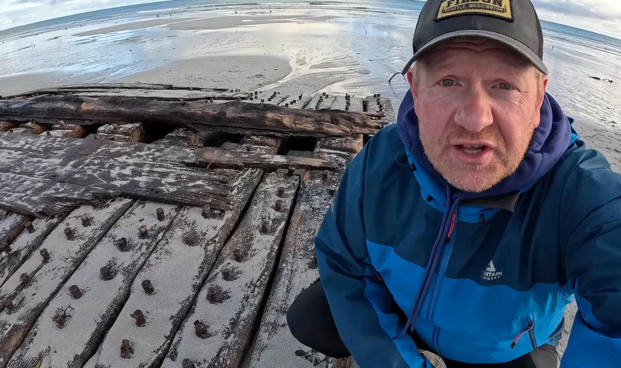 A Shipwreck That Spoke Volumes, Storms Reshape The Sanday Coastline, Unusual Timbers Revealed By The Tide, Discovery Credited To A Local Schoolboy, Discovery Credited To A Local Schoolboy (Cont.), Islanders Mobilize To Recover The Remains, Timbers Were Hauled To Safety By Hand And Tractor, Dendrochronology Pinpoints The Era, Dendrochronology Pinpoints The Era (Cont.), Wessex Archaeology Takes The Lead On Study, Microscopic Grain Patterns Support Naval Origin, Archival Clues Narrow The Field To HMS Hind, Archival Clues Narrow The Field To HMS Hind (Cont.), A War Frigate Built For Empire, A War Frigate Built For The Empire (Cont.), She Crossed Oceans Under The Union Jack, A Whaling Vessel Venturing To The North, The Crew Faced Ice, Isolation, And Peril, March 1788 Marks The End, All 56 Sailors Survived The Ordeal, Lopness Bay Became A Silent Tomb, Folklore Preserved Fragments Of The Tale, Funding Secured For Long-Term Study, Funding Secured For Long-Term Study (Cont.), The Community Leads Its Own Maritime Revival