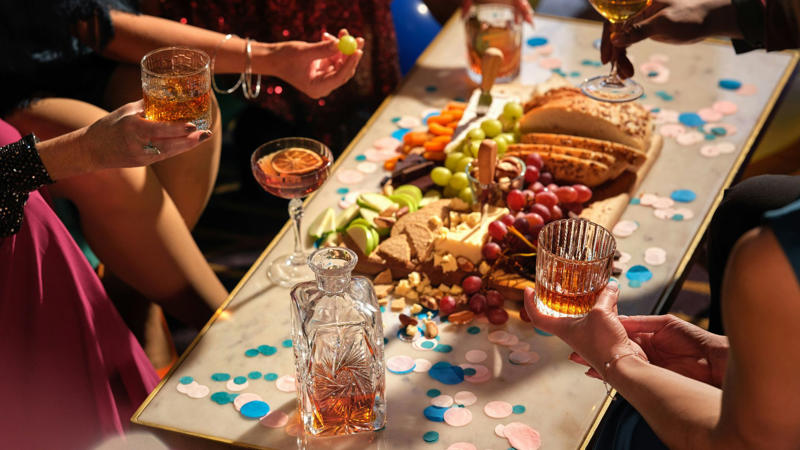 1. Parmesan Crisps, 2. Bacon-Wrapped Dates, 3. Prosciutto-Wrapped Melon, 4. Mini Beef Wellingtons, 5. Buffalo Cauliflower Bites, 6. Soft Pretzel Bites with Hot Mustard, 7. Spicy Deviled Eggs, 8. Antipasto Skewers, 9. Roasted Sweet Potato Rounds with Goat Cheese &amp; Pecans, 10. Turkey Pinwheels, 11. Crostini with Ricotta &amp; Honey, 12. Hummus-Stuffed Cherry Tomatoes, 13. Fried Ravioli, 14. Mini Tostadas, 15. Tuna Tartare on Wonton Crisps, 16. Mini Lobster Rolls, 17. Brie and Cranberry Phyllo Cups, 18. Mini Crab Cakes with Aioli, 19. Marinated Mozzarella Balls, 20. Mini Grilled Cheese with Tomato Soup Shooters