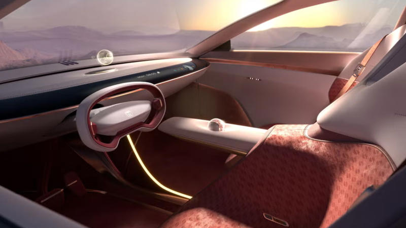 This vehicle has large dimensions and features, Its exterior design features include scissor doors, Deployable wings on the rear improve stability, Manual and automated driving modes are available, The cabin features a unique wormhole interface, No plans to produce this vehicle, GM China Advanced Design Center developed this concept
