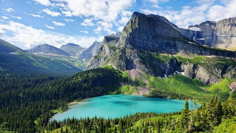 25 Beautiful Places And National Parks To Visit This Year Wildflowers at Mount Rainier, The Arches National Park, Yoho National Park, Capitol Reef National Park, Olympic National Park, Grand Teton National Park, Jenny Lake, Moraine Lake, Banff National Park, Sleeping Bear Dunes, Crater Lake, Great Smoky Mountains National Park, North Cascades, Harz National Park, Germany, Taroko National Park, Japan, Canyonlands National Park, Glacier National Park, Mount Rainier National Park, Lassen Volcanic National Park, Wicklow Mountains National Park, Ireland, Zion National Park, Yosemite National Park