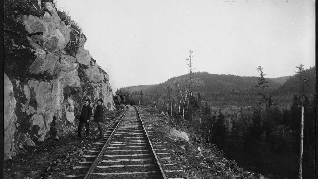 11. Checking to see if there would be any rock slides onto the railroad 1. The day the Transcontinental Railroad was officially completed in Colorado, August 15, 1870, 2. A Native American looking down on the newly completed section of the Transcontinental Railroad, 3. Celebrating the completion of the Transcontinental Railroad in Promontory Point, Utah, 1869, 4. Hopping on the handcar to get to work on the Transcontinental Railroad, 1860s, 5. All hands on deck, 1864, 6. Laborers laid an average of ten miles of track per day, 7. The Dale Creek Crossing, a wooden railroad, under construction during the building of the Transcontinental Railroad, 1868, 8. Heading to the tracks to witness the completion of the railroad, 1870, 9. The Jupiter train, which was one of the first locomotives on the Transcontinental Railroad, 1860s, 10. Workers had to cut through 1,000 miles of trees through the narrows of Weber Canyon, 1869, 11. Checking to see if there would be any rock slides onto the railroad, 12. The Central Pacific First Transcontinental Railroad, built from Sacramento, California, to Summit, Utah in 1865, 13. A railroad camp near Victory, 1869, 14. Would you trust this bridge on the Central Pacific side of the Transcontinental Railroad?, 15. Imagine all of the work that went into digging through that mountain