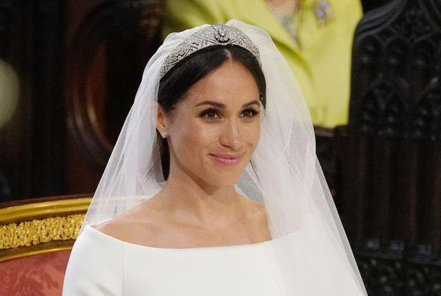 It took 3,900 hours of work by 50 people., Dressmakers had to wash their hands every 30 minutes while making Meghan's 16-foot-veil., Meghan's wedding-day tiara was the last royal tiara she ever wore., The dress featured a hidden, sentimental "something blue.", Meghan's second wedding dress was a Stella McCartney halter gown.