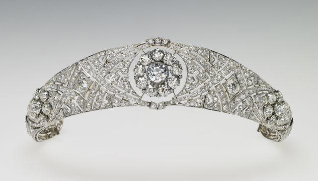 It took 3,900 hours of work by 50 people., Dressmakers had to wash their hands every 30 minutes while making Meghan's 16-foot-veil., Meghan's wedding-day tiara was the last royal tiara she ever wore., The dress featured a hidden, sentimental "something blue.", Meghan's second wedding dress was a Stella McCartney halter gown.