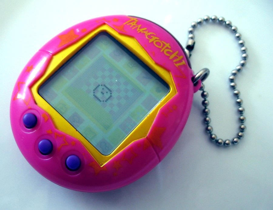 Vintage Tamagotchi Virtual Pets Retro Collectibles That Are Still Loved Today, Original 1980s My Little Pony Toys, 1977 Kenner Star Wars Action Figures, Vintage Tamagotchi Virtual Pets, Classic Rubik’s Cube Puzzle, 1990s Polly Pocket Compacts, Nintendo Game Boy Handheld Console, 1984 Transformers G1 Figures, Beanie Babies By Ty Inc., 1982 Masters Of The Universe Toys, Original Cabbage Patch Kids Dolls, 1990s Pogs And Slammers, Atari 2600 Video Game System, Lisa Frank Stationery Sets, Garbage Pail Kids Trading Cards, 1970s Evel Knievel Stunt Cycle