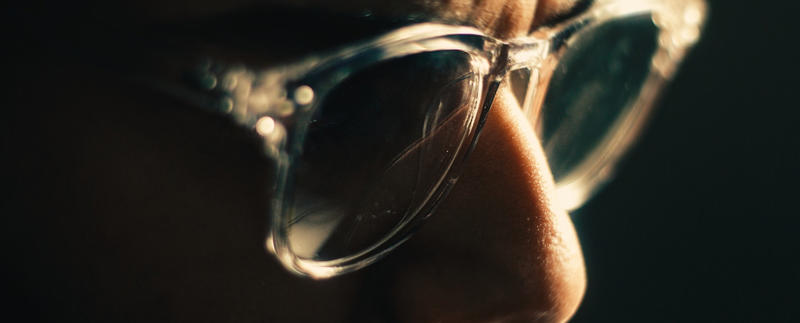 1. Ray-Ban Aviators in Top Gun, 2. John Lennon's Signature Circular Shades, 3. Elton John's Flamboyant On-Stage Specs, 4. Audrey Hepburn's Oversized, Window-shopping Shades, 5. Jackie Onassis: America's Coolest First Lady, 6. Lawrence Fishburn's Matrix Clip-on Look, 7. The Blues Brothers' Ray-Ban Wayfarers, 8. Madonna's Lives in a Material, Cat-eye World, 9. Andy Warhol's Chunky Black Frames, 10. Kurt Cobain's White "Clout Goggles", 11. Cyclops' Futuristic and Highly Necessary Visor, 12. Michael Jackson's Trademark Tour Aviators, 13. Bono's Tinted Rock Star Wrap-arounds, 14. James Dean's Rebellious, Rounded Sunglasses, 15. The Men in Black's Simple Black Shades