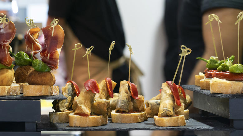 Sardines De Espeto, Tortilla Española, Pescados Fritos, Tortilla Del Sacromonte, Chirimoya, Fritura Malagueña, Ajo Blanco, Churros Con Chocolate