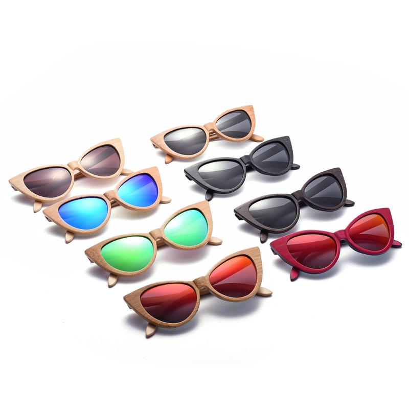 1. Ray-Ban Aviators in Top Gun, 2. John Lennon's Signature Circular Shades, 3. Elton John's Flamboyant On-Stage Specs, 4. Audrey Hepburn's Oversized, Window-shopping Shades, 5. Jackie Onassis: America's Coolest First Lady, 6. Lawrence Fishburn's Matrix Clip-on Look, 7. The Blues Brothers' Ray-Ban Wayfarers, 8. Madonna's Lives in a Material, Cat-eye World, 9. Andy Warhol's Chunky Black Frames, 10. Kurt Cobain's White "Clout Goggles", 11. Cyclops' Futuristic and Highly Necessary Visor, 12. Michael Jackson's Trademark Tour Aviators, 13. Bono's Tinted Rock Star Wrap-arounds, 14. James Dean's Rebellious, Rounded Sunglasses, 15. The Men in Black's Simple Black Shades