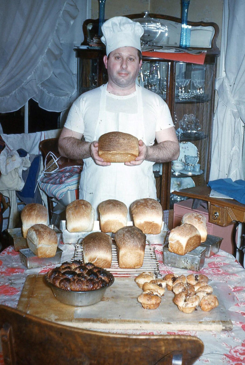 13. A Baker and His Bread (1950s) 1. Boys Setting Up Their Train Model (1946), 2. Dangerous Curves (1949), 3. Before Prom (1967), 4. Going for a Ride in the Convertible (1957), 5. Enjoying a Day at the Public Pool (1960s), 6. Mespelbrunn Castle in Bavaria, Germany, 7. Diving Contest in Palm Beach, Florida (1959), 8. Waiting on a Prom Date (1950s), 9. A Husband’s Portrait of His Wife (1954), 10. Times Square (1959), 11. Little Girl Fishing on the North Shore of Oahu (1960), 12. Couple on Vacation in Florida (1950s), 13. A Baker and His Bread (1950s), 14. Kids Posing by Their Family Vehicle (1966), 15. Brothers Playing in the Snow (1963), 16. Dogs Like Rides Too (1962), 17. Orphan Children from Mooseheart, Illinois (1948), 18. Stopping at Texaco on a Road Trip (1958), 19. Toddler Walking Around in Flowers (1954), 20. Boys on a Camping Trip (1965), 21. Saying Goodbye to Grandma (1950), 22. Picnic in France (1969), 23. A Night at the Bar (1950s), 24. Typical Teen Party (1978)