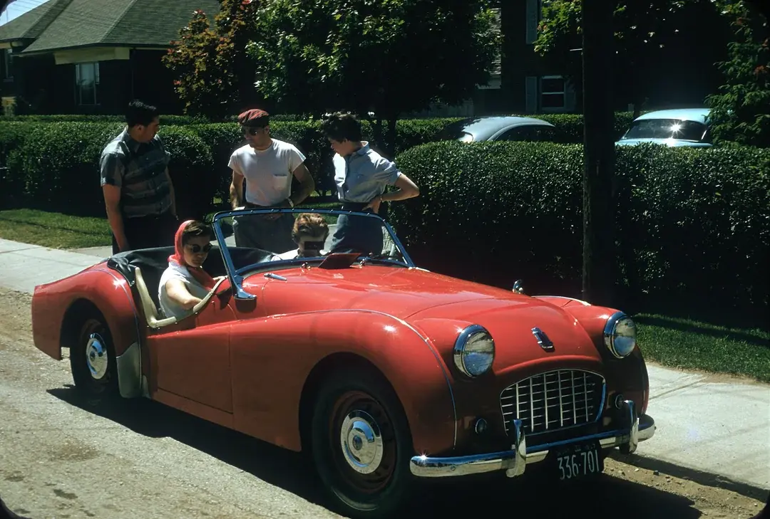 4. Going for a Ride in the Convertible (1957) 1. Boys Setting Up Their Train Model (1946), 2. Dangerous Curves (1949), 3. Before Prom (1967), 4. Going for a Ride in the Convertible (1957), 5. Enjoying a Day at the Public Pool (1960s), 6. Mespelbrunn Castle in Bavaria, Germany, 7. Diving Contest in Palm Beach, Florida (1959), 8. Waiting on a Prom Date (1950s), 9. A Husband’s Portrait of His Wife (1954), 10. Times Square (1959), 11. Little Girl Fishing on the North Shore of Oahu (1960), 12. Couple on Vacation in Florida (1950s), 13. A Baker and His Bread (1950s), 14. Kids Posing by Their Family Vehicle (1966), 15. Brothers Playing in the Snow (1963), 16. Dogs Like Rides Too (1962), 17. Orphan Children from Mooseheart, Illinois (1948), 18. Stopping at Texaco on a Road Trip (1958), 19. Toddler Walking Around in Flowers (1954), 20. Boys on a Camping Trip (1965), 21. Saying Goodbye to Grandma (1950), 22. Picnic in France (1969), 23. A Night at the Bar (1950s), 24. Typical Teen Party (1978)