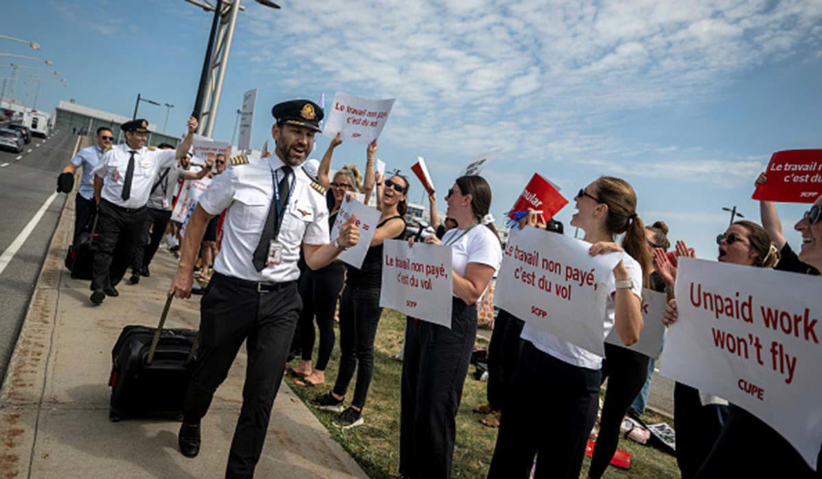 STAFF WILL BE HELD ACCOUNTABLE RISK OF JAIL TIME, STRIKES SET TO CONTINUE, 'WE'RE LOOKING FOR A SOLUTION HERE', CARNEY PUSHES FOR SOLUTION, AIR CANADA SHARES DOWN, STAFF WILL BE HELD ACCOUNTABLE, 'THERE IS NO LOCKOUT IN PLACE', STAFF ASK FOR AIR TRANSAT RATES, FULL REFUNDS FOR PASSENGERS, WHAT DID AIR CANADA OFFER?