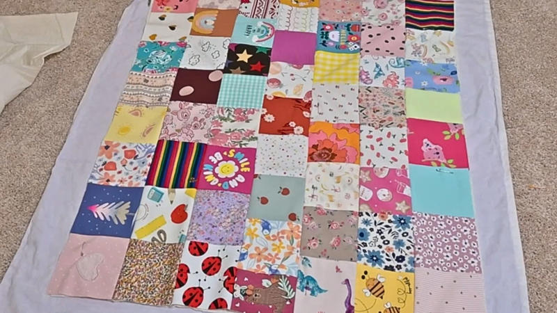 5. Keepsake Quilt 1. Personalized Baby Memory Book, 2. Diaper Subscription Service, 3. Non-Contact Infrared Thermometer, 4. White Noise Machine, 5. Keepsake Quilt, 6. Baby Food Maker, 7. Ergonomic Baby Carrier, 8. Hand And Footprint Kit, 9. Monthly Milestone Blanket, 10. Convertible Diaper Bag Backpack, 11. Baby Massage Oil Set, 12. Silicone Bibs With Food Catcher, 13. Hooded Animal Baby Towel, 14. Portable Changing Pad, 15. Baby Sleep Sack, 16. Baby Sensory Play Mat, 17. Personalized Growth Chart, 18. Baby Grooming/Health Kit, 19. Family Photo Session Voucher, 20. Organic Cotton Baby Clothing Set