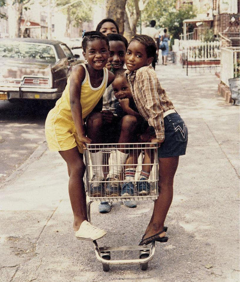 1. Kids Playing in the Streets of Brooklyn, New York, 1950, 2. Neighborhood Baseball on a Quiet Suburban Street, 1958, 3. Neighborhood Bike Gang, 1970s, 4. ‘Kids Playing Outside in Dumont, New Jersey, 1977’, 5. Homemade Playground in an Alley, 1950, 6. Someone Give This Kid a Stuntman Career, 1980s, 7. Children Playing on Peace Street in London’s East End, 1950s, 8. Just Some Friends Turning an Old Barrel Into the Perfect Playground, 9. This Jungle Gym Would Certainly Not Fly Today, 1942, 10. Scaling Brick Walls in Abandoned Building Was Just Part of the Fun, 11. Skater Boys Unite! New Jersey, Late ’80s, 12. A Police Officer Plays Tag With Local Kids in Harlem, New York, 1978, 13. Neighborhood War Games With Makeshift Weapons, 1960s, 14. Cutest Repair Shop I Ever Did See, 15. ‘Neighborhood Kids Playing War in Washington D.C., 1942’, 16. Just Some Buddies Hanging Out in Sydney, Australia, 1989, 17. Summertime Fun With a Shopping Cart, Harlem, New York, 1980s, 18. There’s a New Sheriff in Town and He Ain’t Playing Around, 19. ‘Kids Playing Street Hockey, 1976’