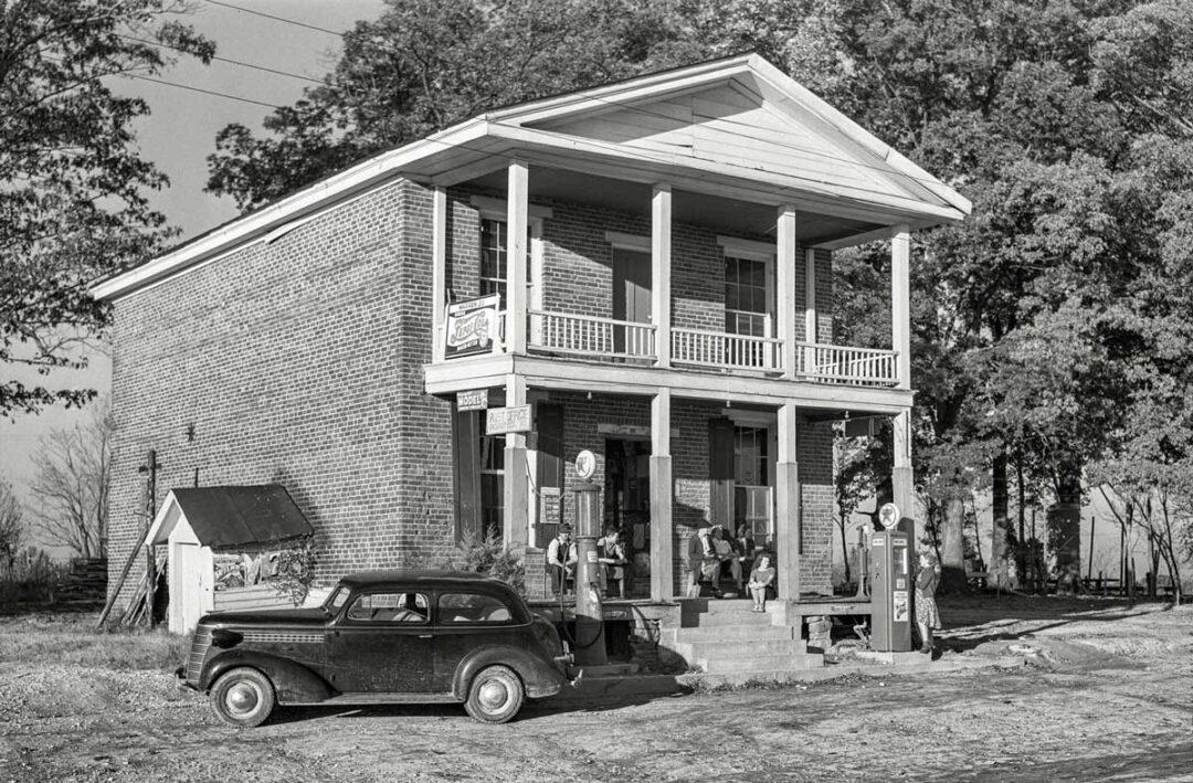 1. Country Store in Oklahoma (1940), 2. Uncle Newt’s Store in Hardin, Tennessee (1945), 3. Woman Looking in a ‘Men Only’ Machine at the Vermont Country Store (1954), 4. Checking Out at a Lynchburg, Tennessee, Store (1972), 5. Double Decker Store in Prospect Hill, North Carolina (1940), 6. McLeary Store, Outside of Salem, Oregon (1959), 7. W.B. Queen, a Fiddler, Playing in a Country Store in Tellico Plains, Tennessee (1941), 8. Soldiers From Fort Benning Playing Pinball in an Alabama Country Store (1941), 9. Putting Ice in the Soft Drink Refrigerator at a Store in Arkansas (1938), 10. General Store in Bigheart, Oklahoma (1908), 11. Grinding Coffee at the General Store in Castolon, Texas (1939), 12. Poolroom at the General Store in Granville County, North Carolina (1940), 13. Manning the Counter (1973), 14. General Store in Moundville, Alabama (1936), 15. Dowd’s Store in Fibre, Michigan (1952), 16. Farm Boy at a General Store Pop Stand in Iowa (1939), 17. Country Store Off a Dirt Road in North Carolina (1939)