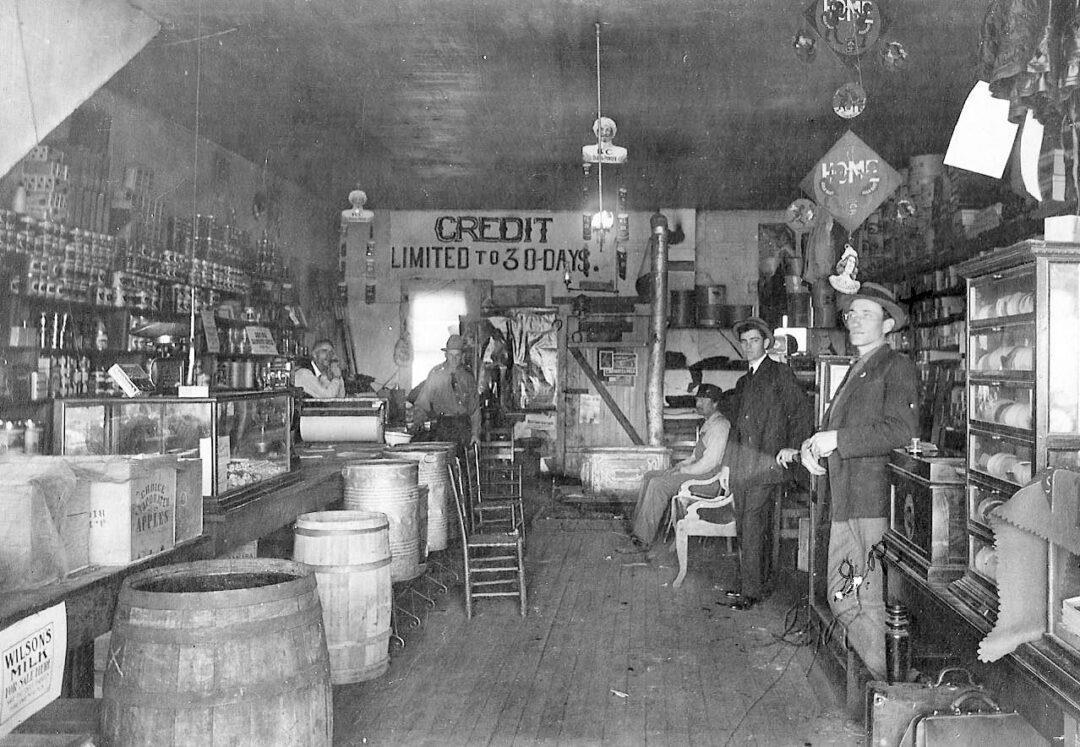 1. Country Store in Oklahoma (1940), 2. Uncle Newt’s Store in Hardin, Tennessee (1945), 3. Woman Looking in a ‘Men Only’ Machine at the Vermont Country Store (1954), 4. Checking Out at a Lynchburg, Tennessee, Store (1972), 5. Double Decker Store in Prospect Hill, North Carolina (1940), 6. McLeary Store, Outside of Salem, Oregon (1959), 7. W.B. Queen, a Fiddler, Playing in a Country Store in Tellico Plains, Tennessee (1941), 8. Soldiers From Fort Benning Playing Pinball in an Alabama Country Store (1941), 9. Putting Ice in the Soft Drink Refrigerator at a Store in Arkansas (1938), 10. General Store in Bigheart, Oklahoma (1908), 11. Grinding Coffee at the General Store in Castolon, Texas (1939), 12. Poolroom at the General Store in Granville County, North Carolina (1940), 13. Manning the Counter (1973), 14. General Store in Moundville, Alabama (1936), 15. Dowd’s Store in Fibre, Michigan (1952), 16. Farm Boy at a General Store Pop Stand in Iowa (1939), 17. Country Store Off a Dirt Road in North Carolina (1939)