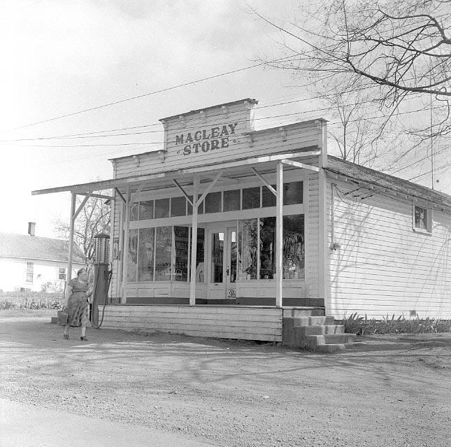 1. Country Store in Oklahoma (1940), 2. Uncle Newt’s Store in Hardin, Tennessee (1945), 3. Woman Looking in a ‘Men Only’ Machine at the Vermont Country Store (1954), 4. Checking Out at a Lynchburg, Tennessee, Store (1972), 5. Double Decker Store in Prospect Hill, North Carolina (1940), 6. McLeary Store, Outside of Salem, Oregon (1959), 7. W.B. Queen, a Fiddler, Playing in a Country Store in Tellico Plains, Tennessee (1941), 8. Soldiers From Fort Benning Playing Pinball in an Alabama Country Store (1941), 9. Putting Ice in the Soft Drink Refrigerator at a Store in Arkansas (1938), 10. General Store in Bigheart, Oklahoma (1908), 11. Grinding Coffee at the General Store in Castolon, Texas (1939), 12. Poolroom at the General Store in Granville County, North Carolina (1940), 13. Manning the Counter (1973), 14. General Store in Moundville, Alabama (1936), 15. Dowd’s Store in Fibre, Michigan (1952), 16. Farm Boy at a General Store Pop Stand in Iowa (1939), 17. Country Store Off a Dirt Road in North Carolina (1939)