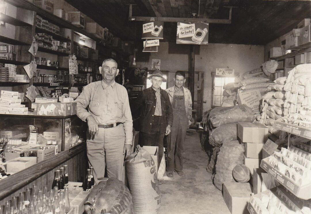 1. Country Store in Oklahoma (1940), 2. Uncle Newt’s Store in Hardin, Tennessee (1945), 3. Woman Looking in a ‘Men Only’ Machine at the Vermont Country Store (1954), 4. Checking Out at a Lynchburg, Tennessee, Store (1972), 5. Double Decker Store in Prospect Hill, North Carolina (1940), 6. McLeary Store, Outside of Salem, Oregon (1959), 7. W.B. Queen, a Fiddler, Playing in a Country Store in Tellico Plains, Tennessee (1941), 8. Soldiers From Fort Benning Playing Pinball in an Alabama Country Store (1941), 9. Putting Ice in the Soft Drink Refrigerator at a Store in Arkansas (1938), 10. General Store in Bigheart, Oklahoma (1908), 11. Grinding Coffee at the General Store in Castolon, Texas (1939), 12. Poolroom at the General Store in Granville County, North Carolina (1940), 13. Manning the Counter (1973), 14. General Store in Moundville, Alabama (1936), 15. Dowd’s Store in Fibre, Michigan (1952), 16. Farm Boy at a General Store Pop Stand in Iowa (1939), 17. Country Store Off a Dirt Road in North Carolina (1939)