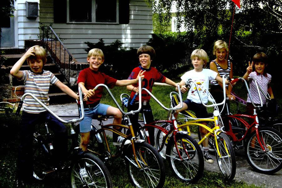 1. Kids Playing in the Streets of Brooklyn, New York, 1950, 2. Neighborhood Baseball on a Quiet Suburban Street, 1958, 3. Neighborhood Bike Gang, 1970s, 4. ‘Kids Playing Outside in Dumont, New Jersey, 1977’, 5. Homemade Playground in an Alley, 1950, 6. Someone Give This Kid a Stuntman Career, 1980s, 7. Children Playing on Peace Street in London’s East End, 1950s, 8. Just Some Friends Turning an Old Barrel Into the Perfect Playground, 9. This Jungle Gym Would Certainly Not Fly Today, 1942, 10. Scaling Brick Walls in Abandoned Building Was Just Part of the Fun, 11. Skater Boys Unite! New Jersey, Late ’80s, 12. A Police Officer Plays Tag With Local Kids in Harlem, New York, 1978, 13. Neighborhood War Games With Makeshift Weapons, 1960s, 14. Cutest Repair Shop I Ever Did See, 15. ‘Neighborhood Kids Playing War in Washington D.C., 1942’, 16. Just Some Buddies Hanging Out in Sydney, Australia, 1989, 17. Summertime Fun With a Shopping Cart, Harlem, New York, 1980s, 18. There’s a New Sheriff in Town and He Ain’t Playing Around, 19. ‘Kids Playing Street Hockey, 1976’