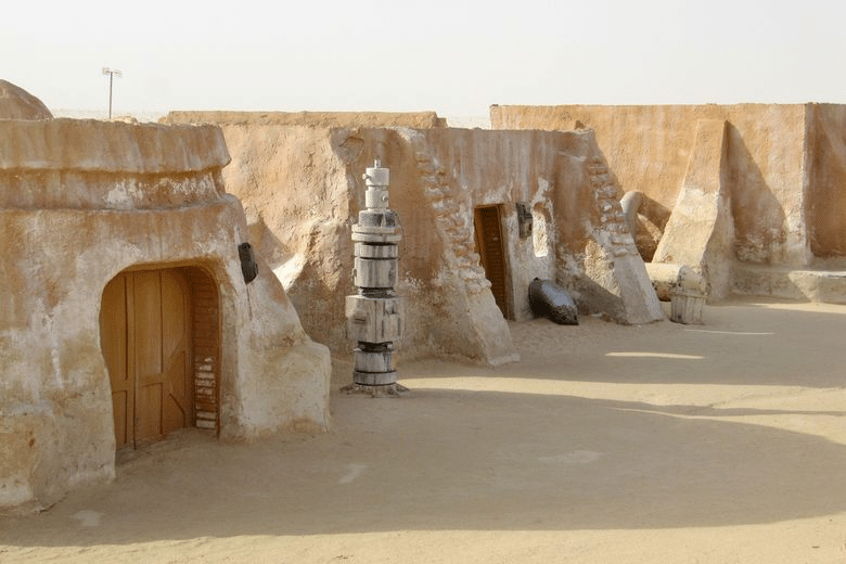 #7: Tatooine Sets – Star Wars (1977) (Tunisia) #1: The Rocky Steps – Rocky (1976) (Philadelphia, PA), #3: Monument Valley – Stagecoach (1939) and Many Westerns (UT/AZ Border), #4: The Stanley Hotel – The Shining (1980) (Estes Park, CO), #7: Tatooine Sets – Star Wars (1977) (Tunisia), #9: Katz’s Delicatessen – When Harry Met Sally (1989) (New York City, NY), #10: Downtown Savannah – Forrest Gump (1994) (Savannah, GA), #12: Highclere Castle – Downton Abbey (2010–2015) (Hampshire, England), #13: Oxford University – The Theory of Everything (2014), Harry Potter (2001–2011), #15: Griffith Observatory – Rebel Without a Cause (1955), La La Land (2016) (Los Angeles, CA), #16: Timberline Lodge – The Shining (1980) (Mt. Hood, OR), #18: The Bench at Notting Hill – Notting Hill (1999) (London, England), #19: The Beach – The Goonies (1985) (Cannon Beach, OR), #21: Baker Street – Sherlock Holmes (2009) (London, England), #22: Skellig Michael – Star Wars: The Last Jedi (2017) (Ireland), #24: Rydell High – Grease (1978) (Venice High School, Los Angeles, CA), #25: Bodega Bay – The Birds (1963) (Bodega, CA)