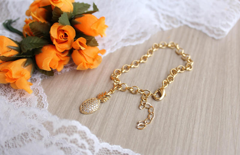 1. Dainty Gold Chain Necklaces, 2. Tiny Diamond or Cubic Zirconia Stud Earrings, 3. Simple Stacking Rings, 4. Thin Hoop Earrings, 5. Sleek Bar Necklaces, 6. Minimalist Ear Cuffs, 7. Geometric Pendants on Delicate Chains, 8. Single Pearl Necklaces or Earrings, 9. Hammered Metal Bangles, 10. Tiny Solitaire Pendants With Clear Stones, 11. Sleek Threader Earrings With Small Crystal Drops, 12. Shiny Ball or Bead Bracelets, 13. Minimalist Nose Studs With a Single Clear Gemstone, 14. Gold or Silver Minimalist Anklets, 15. Delicate Chain Bracelets Set With One or Two Small Gemstones