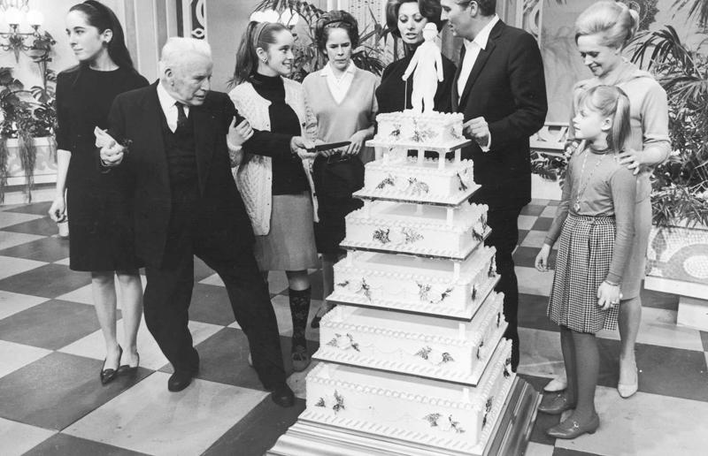 23. Maurice Chevalier's musical cake, 1956, 22. Hank Aaron's baseball tableau cake, 1973, 21. A super-sized sombrero cake, 1933, 20. Pavarotti's artistic cake portrait, 1980, 19. Ingrid Bergman and Charles Boyer's joint birthday cake, 1946, 18. Denise Grey's dual pink birthday cakes, 1985, 17. An elaborate Alice in Wonderland cake, 1932, 16. Shirley Temple's seventh birthday cake, 1936, 15. An extravagant Arc de Triomphe cake, 1983, 14. Glen Campbell's lifelike guitar cake, 1973, 13. A gravity-defying hot air balloon cake, 1933, 12. Elizabeth Taylor's front page cake, 1982, 11. Chuck Berry's rock 'n' roll cake, 1986, 10. Prince Charles' regal 40th birthday cake, 1988, 9. Princess Irene's nautical cake, 1951, 8. An architectural birthday cake, 1981, 7. Queen Charlotte's giant birthday cake, 1930, 6. Franklin D. Roosevelt's monumental birthday cake, 1940, 5. Winston Churchill's 80th birthday cake, 1954, 4. Harry Truman's five-tier birthday cake, 1954, 3. Charlie Chaplin's five-foot birthday cake, 1966, 2. John F. Kennedy's 44th birthday cake, 1961