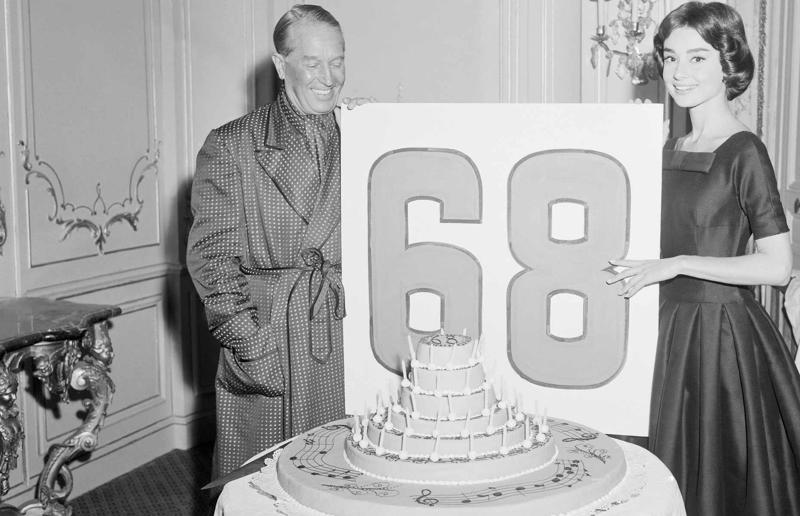 23. Maurice Chevalier's musical cake, 1956, 22. Hank Aaron's baseball tableau cake, 1973, 21. A super-sized sombrero cake, 1933, 20. Pavarotti's artistic cake portrait, 1980, 19. Ingrid Bergman and Charles Boyer's joint birthday cake, 1946, 18. Denise Grey's dual pink birthday cakes, 1985, 17. An elaborate Alice in Wonderland cake, 1932, 16. Shirley Temple's seventh birthday cake, 1936, 15. An extravagant Arc de Triomphe cake, 1983, 14. Glen Campbell's lifelike guitar cake, 1973, 13. A gravity-defying hot air balloon cake, 1933, 12. Elizabeth Taylor's front page cake, 1982, 11. Chuck Berry's rock 'n' roll cake, 1986, 10. Prince Charles' regal 40th birthday cake, 1988, 9. Princess Irene's nautical cake, 1951, 8. An architectural birthday cake, 1981, 7. Queen Charlotte's giant birthday cake, 1930, 6. Franklin D. Roosevelt's monumental birthday cake, 1940, 5. Winston Churchill's 80th birthday cake, 1954, 4. Harry Truman's five-tier birthday cake, 1954, 3. Charlie Chaplin's five-foot birthday cake, 1966, 2. John F. Kennedy's 44th birthday cake, 1961