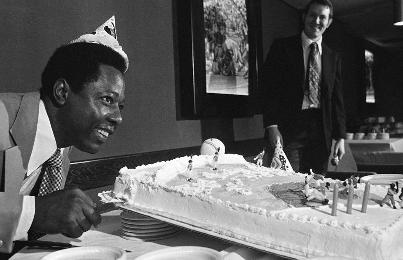 23. Maurice Chevalier's musical cake, 1956, 22. Hank Aaron's baseball tableau cake, 1973, 21. A super-sized sombrero cake, 1933, 20. Pavarotti's artistic cake portrait, 1980, 19. Ingrid Bergman and Charles Boyer's joint birthday cake, 1946, 18. Denise Grey's dual pink birthday cakes, 1985, 17. An elaborate Alice in Wonderland cake, 1932, 16. Shirley Temple's seventh birthday cake, 1936, 15. An extravagant Arc de Triomphe cake, 1983, 14. Glen Campbell's lifelike guitar cake, 1973, 13. A gravity-defying hot air balloon cake, 1933, 12. Elizabeth Taylor's front page cake, 1982, 11. Chuck Berry's rock 'n' roll cake, 1986, 10. Prince Charles' regal 40th birthday cake, 1988, 9. Princess Irene's nautical cake, 1951, 8. An architectural birthday cake, 1981, 7. Queen Charlotte's giant birthday cake, 1930, 6. Franklin D. Roosevelt's monumental birthday cake, 1940, 5. Winston Churchill's 80th birthday cake, 1954, 4. Harry Truman's five-tier birthday cake, 1954, 3. Charlie Chaplin's five-foot birthday cake, 1966, 2. John F. Kennedy's 44th birthday cake, 1961