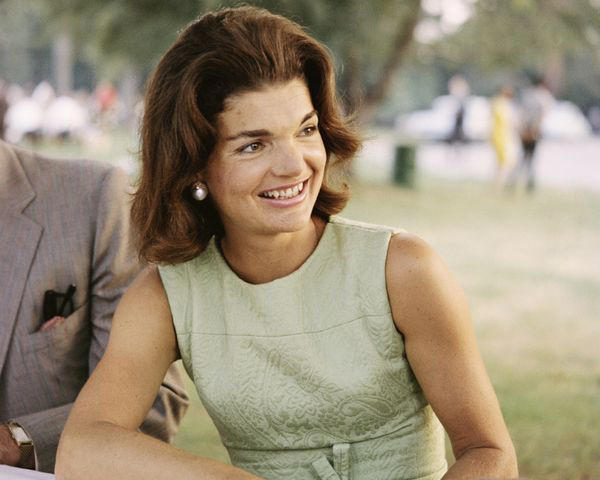 It was a platinum eternity band featuring diamonds and sapphires., It was inspired by one of Jackie Kennedy’s rings., The ring is estimated to have cost ,000., JFK Jr. proposed during a July 1995 fishing trip., Her wedding band was cast from the rib of a rattlesnake.