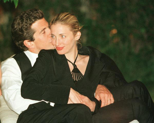 It was a platinum eternity band featuring diamonds and sapphires., It was inspired by one of Jackie Kennedy’s rings., The ring is estimated to have cost ,000., JFK Jr. proposed during a July 1995 fishing trip., Her wedding band was cast from the rib of a rattlesnake.