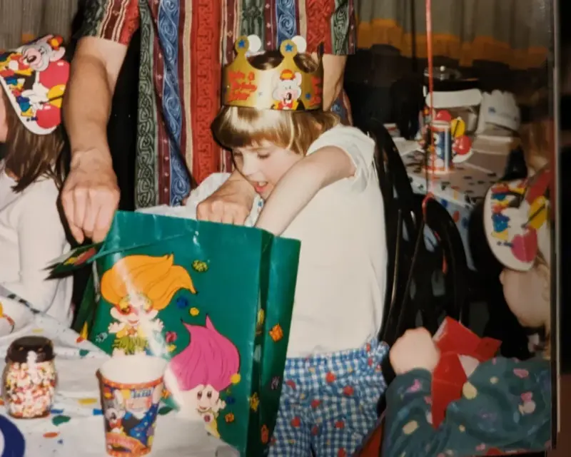 1. Core Memories in the Making, 2. Fresh Pizza Delivered By Chuck Himself? Talk About Birthday Goals, 2. ‘Looking Tough on My 6th Birthday at Chuck E. Cheese in 1996’, 4. Admittedly, Chuck Looked a Bit Creepy at Times, 5. Bet He Remembers the Rage to This Day: ‘The Exact Moment a Random Kid Blew Out My Candles at Chuck E. Cheese in 1991’, 6. A Crown Fit for a [Small] Queen, 7. ‘My Chuck E. Cheese Birthday Party, 1986’, 8. Enjoying Some Pizza While Watching the Animatronic Band, 9. ‘Birthday Party at the Very First Chuck E. Cheese in the Old Town and Country Village Shopping Center’, 10. ‘Fun Birthday Party at Chuck E. Cheese, Late ’80s’, 11. Grown Up Parties Welcome, Too!, 12. No Birthday Was Complete Before All the Gifts Were Opened, 13. You Don’t Say: ‘Me in 1987 With a Creepy-Looking Chuck E Cheese’, 14. ‘At Chuck E. Cheese Proudly Showing Off My Coins, 1993’, 15. ‘Me at Chuck E. Cheese on My 5th Birthday, July 1982’