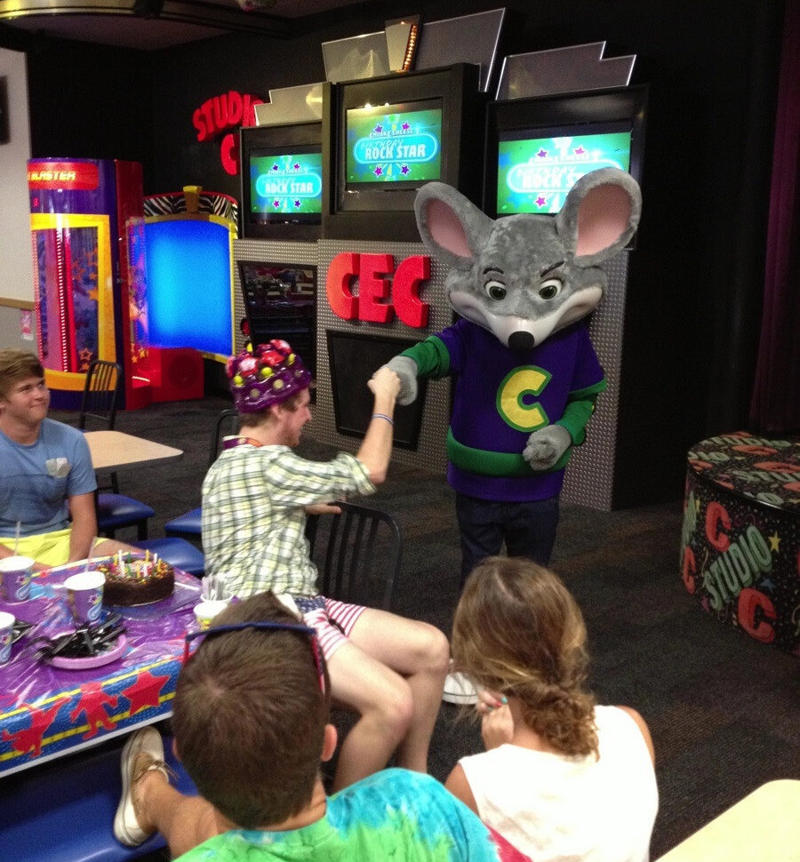 1. Core Memories in the Making, 2. Fresh Pizza Delivered By Chuck Himself? Talk About Birthday Goals, 2. ‘Looking Tough on My 6th Birthday at Chuck E. Cheese in 1996’, 4. Admittedly, Chuck Looked a Bit Creepy at Times, 5. Bet He Remembers the Rage to This Day: ‘The Exact Moment a Random Kid Blew Out My Candles at Chuck E. Cheese in 1991’, 6. A Crown Fit for a [Small] Queen, 7. ‘My Chuck E. Cheese Birthday Party, 1986’, 8. Enjoying Some Pizza While Watching the Animatronic Band, 9. ‘Birthday Party at the Very First Chuck E. Cheese in the Old Town and Country Village Shopping Center’, 10. ‘Fun Birthday Party at Chuck E. Cheese, Late ’80s’, 11. Grown Up Parties Welcome, Too!, 12. No Birthday Was Complete Before All the Gifts Were Opened, 13. You Don’t Say: ‘Me in 1987 With a Creepy-Looking Chuck E Cheese’, 14. ‘At Chuck E. Cheese Proudly Showing Off My Coins, 1993’, 15. ‘Me at Chuck E. Cheese on My 5th Birthday, July 1982’